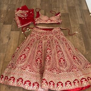 Red and silver Embroidered Lehenga Set